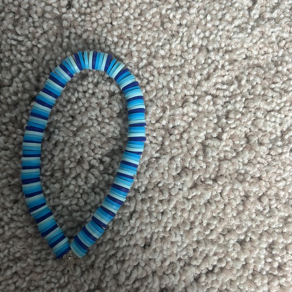 one chevron string bracelet and one matching blue clay bead bracelet - Picture 2 of 3